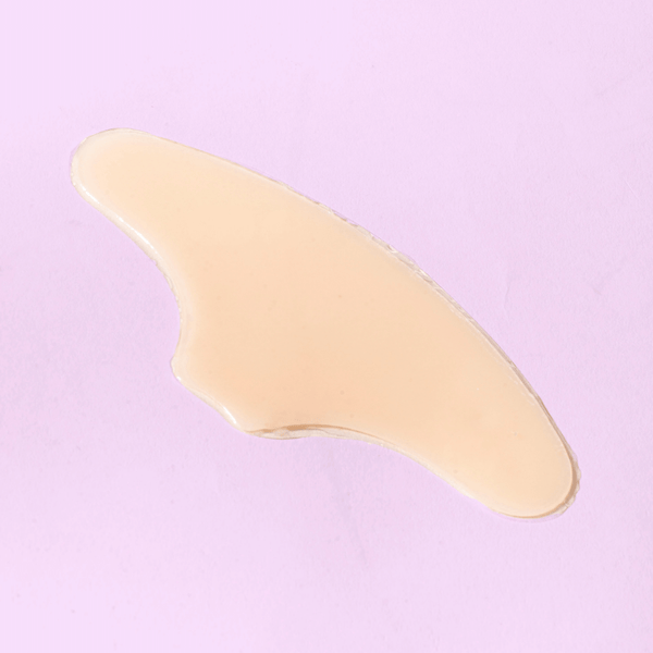 Skin Plumping Reusable Forehead Pad | Dreambox Beauty shown on a soft pink background, designed for skincare and wellness recovery tools.
