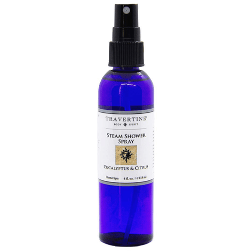 Blue spray bottle labeled Eucalyptus + Citrus Steam Shower Spray | Travertine Spa for enhancing wellness and body care with refreshing scent.