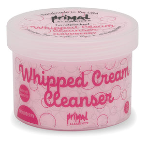Cloudberry Whipped Cream Cleanser | Primal Elements in a pink container with decorative bubble patterns, designed for gentle skincare and cleansing with natural ingredients.