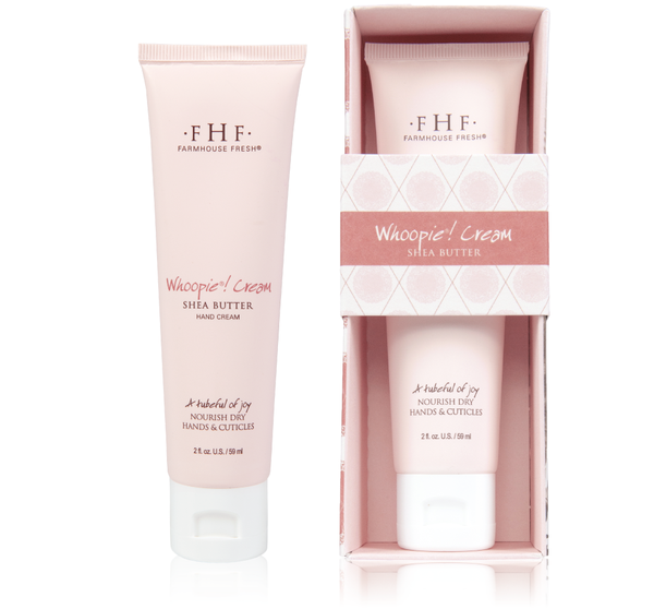 Two tubes of Whoopie® Cream Shea Butter Hand Cream | Farmhouse Fresh, one displayed outside and one in soft pink packaging, designed to nourish dry hands and cuticles.
