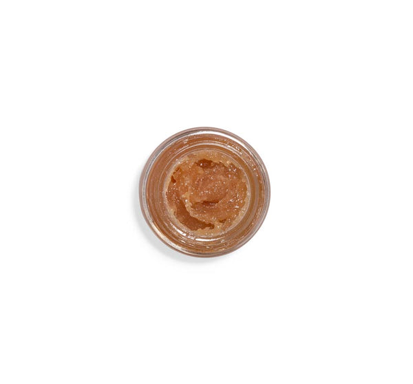 Top view of an open jar of Whoopie® Lip Polish | Farmhouse Fresh, showing the textured, sugar-based lip scrub inside designed for gentle exfoliation and lip care.
