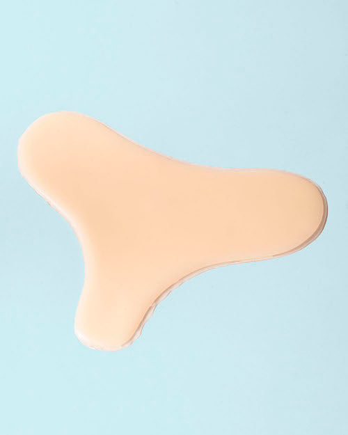 Skin Plumping Reusable Chest Pad | Dreambox Beauty in a smooth, pale beige material designed for skincare and body care wellness use.