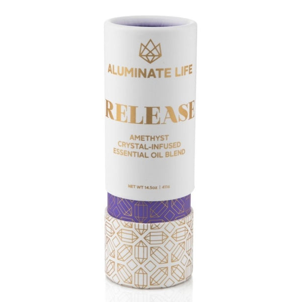 Packaging tube for Release Essential Oil Vial | Aluminate Life featuring amethyst crystal-infused essential oil blend, designed for wellness and body care.