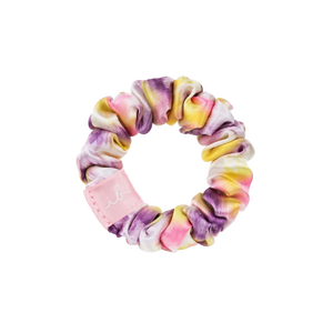 LOOP 3 pc | invisibobble fabric scrunchie with a pastel tie-dye pattern in pink, yellow, and purple shades designed for gentle, stylish hair care.