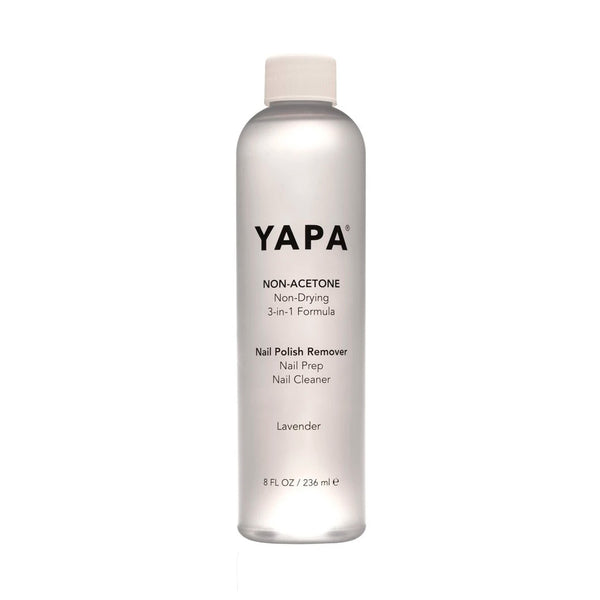 Clear bottle of Non-Acetone Remover | YAPA with white cap, featuring a lavender-scented, non-drying formula for nail polish removal, nail prep, and nail cleaning.