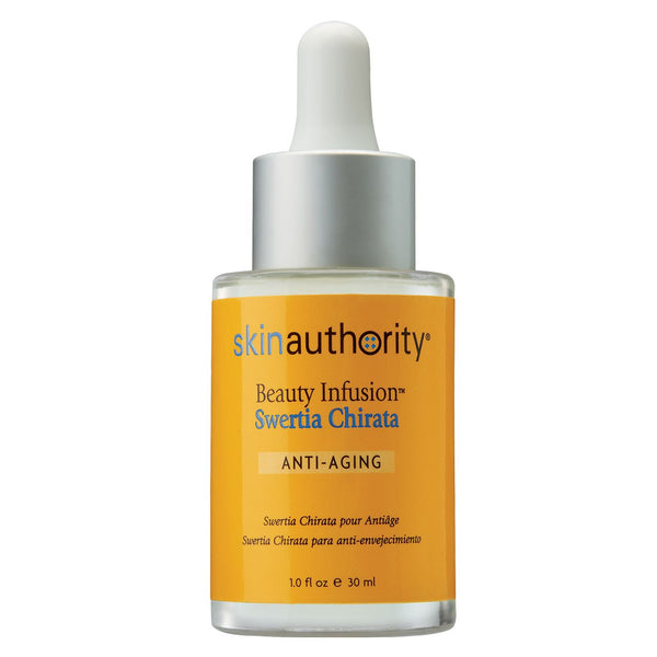 A dropper bottle of Beauty Infusion Swertia Chirata for Anti-Aging | Skin Authority skincare product with a yellow label and silver cap designed for anti-aging skin care.