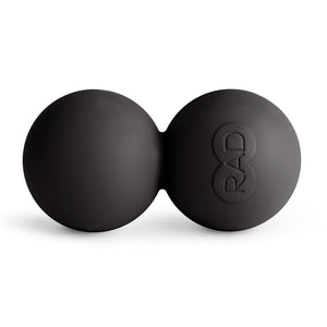 Black double lacrosse massage ball with a smooth matte finish and the embossed RAD logo, designed for targeted muscle recovery and myofascial release, RAD Roller Stiff | RAD.
