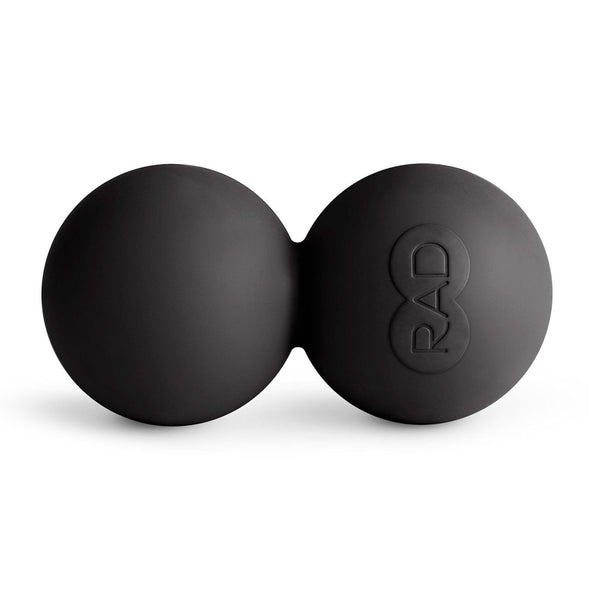 Black double lacrosse massage ball with a smooth matte finish and the embossed RAD logo, designed for targeted muscle recovery and myofascial release, RAD Roller Stiff | RAD.