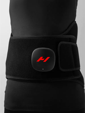 Person wearing a black Venom 2 Back | Hyperice recovery tool belt with a slim, adjustable design for targeted back pain relief and muscle recovery.